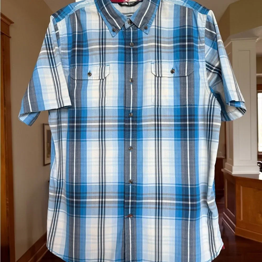 The Northface Large Blue Plaid Men's Shirt Short Sleeve Button Front.
